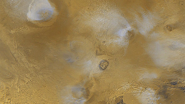 Water frost found on Mars' volcanoes in 'significant first,' scientists say