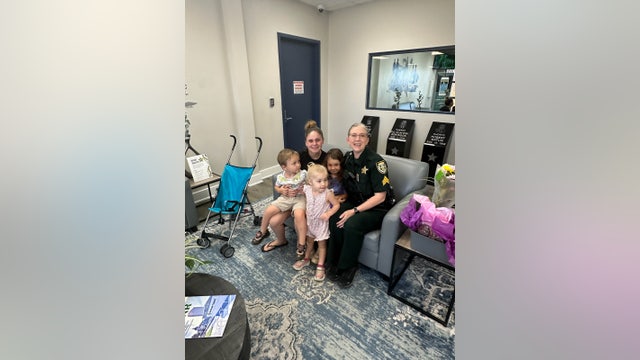 Florida woman reunites with 'hero' deputy who comforted her during childhood tragedy