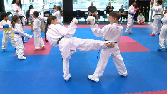 Competitive Florida siblings drive each other to win gold at AAU Karate Nationals