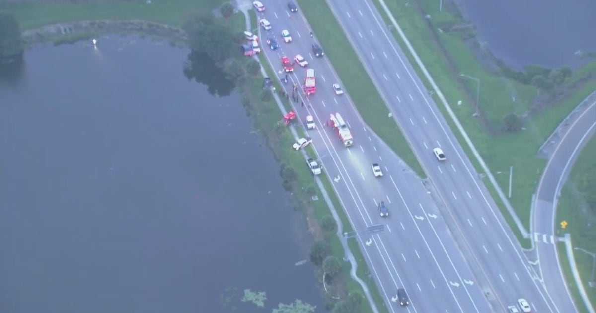 Car in water after crash on East Colonial, near 408 in Orlando ...