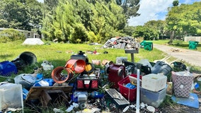 Florida homeowners frustrated with trash piles accumulating at vacant home: 'Nothing is getting done'