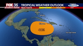 Potential Caribbean system likely to develop over the weekend or early next week, NHC says