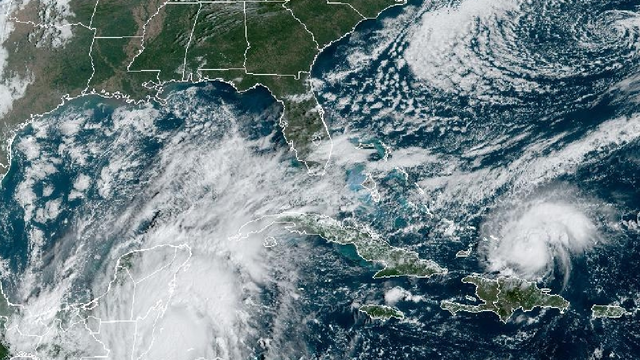 Tropical Storm Nadine makes landfall in Belize; Oscar becomes small, powerful hurricane