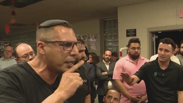 Man escorted out of Orange County zoning meeting after fiery exchange