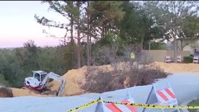 60-foot sinkhole in Clermont swallows large amount of land, threatens nearby shopping plaza