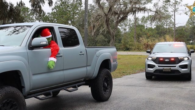 Watch: Florida Grinch arrested for drinking eggnog while driving in PSA video