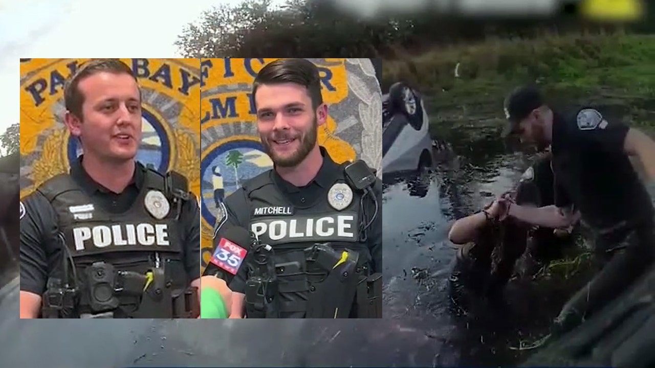 Officers who saved pregnant woman from flipped, submerged SUV recount rescue