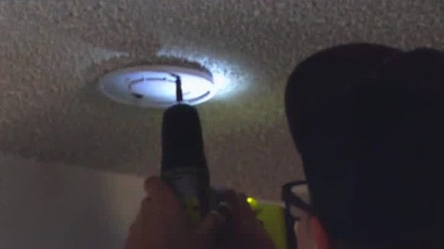 Firefighters and volunteers install free smoke detectors in Seminole County