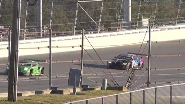 Dedicated fans wait through the night to watch the Rolex 24 race in Daytona