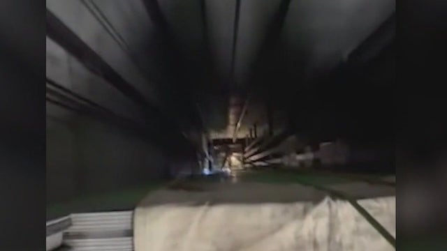 Orlando firefighters scale elevator shaft to rescue trapped person