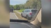 'Sick of it': Melbourne parents worry about student safety with cars driving on sidewalks to cut pick-up line