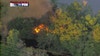 Crews extinguish morning brush fire in Orange County