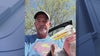 Florida angler attempts to save great blue heron ensnared in fishing line