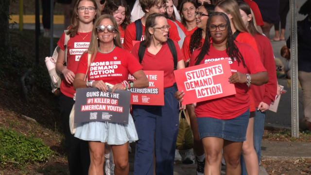University of Florida students rally for stronger gun laws after deadly school shooting