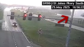 Tornado spins by Florida traffic camera