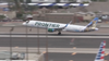 Frontier flight returns to Orlando Airport over 'unusual odor'; 4 crew members seek medical treatment