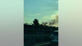 Multiple vehicles damaged after fire breaks out at MCO parking garage, officials say