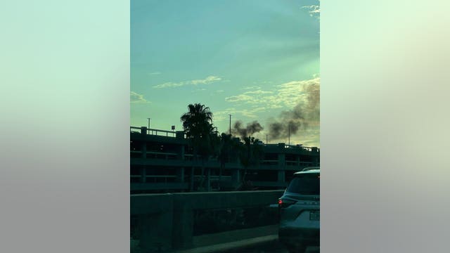 Multiple vehicles damaged after fire breaks out at MCO parking garage, officials say