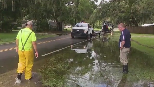 Flash flooding hits parts of Central Florida as some residents scramble to salvage belongings