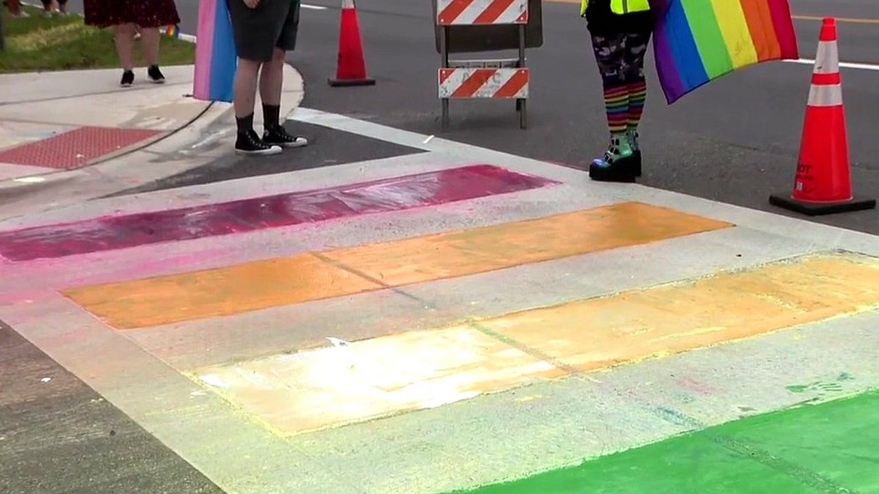 Defiant protesters repaint Pulse Memorial crosswalk in rainbow