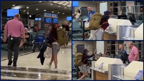 Video: Woman tries to kick Southwest employee, punches computers in viral tirade