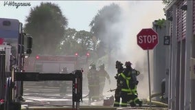 Brevard County Bomb Squad works to remove grenade from burned storage facility