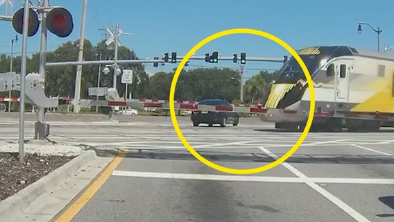 VIDEO: Brevard County driver almost hit by Brightline train after stopping on railroad tracks