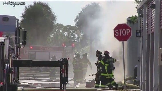 Brevard County Bomb Squad works to remove grenade from burned storage facility