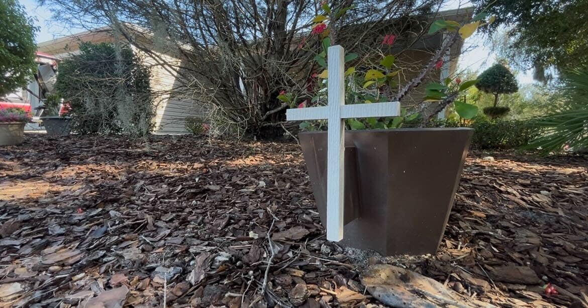 Florida homeowner sued by community district over foot-tall cross, wins $70,000