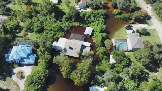 Florida couple gets help to pump floodwater out of Titusville home