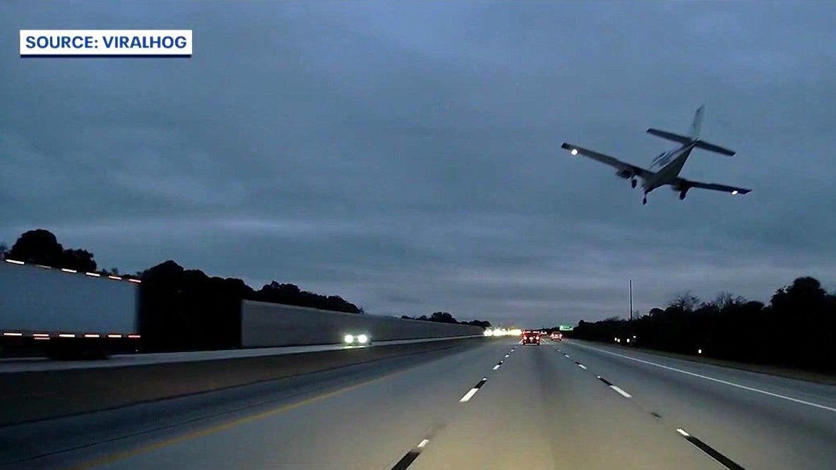 Father, son escape plane crash by seconds while driving down I-95