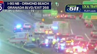 Ambulance hit while responding to crash on I-95 in Volusia County, FHP says