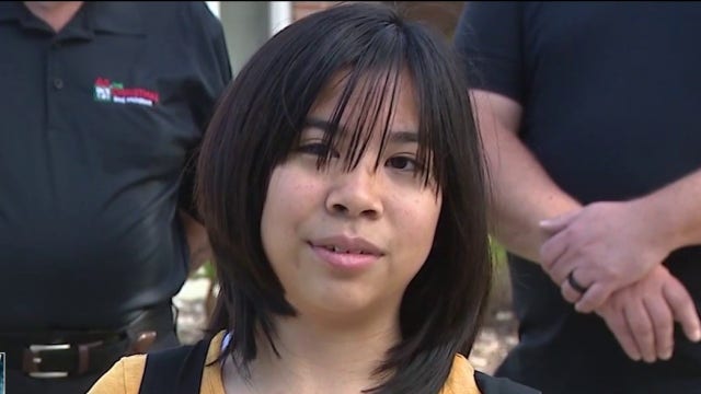 Oviedo police officers gift student bike to get to school safely