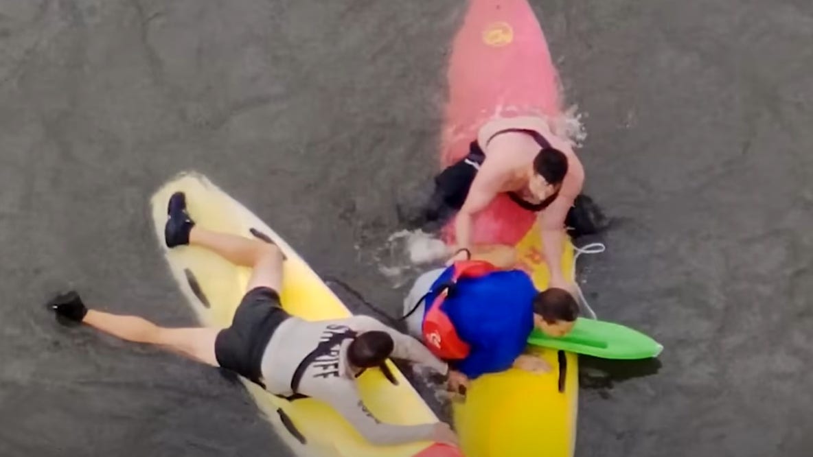 Suspect jumps into Halifax River, is pursued and captured by officers on paddleboards