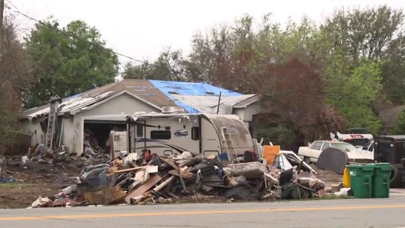 Port St. John 'hoarder house' homeowner fends off foreclosure as neighbors worry about trash piling up again