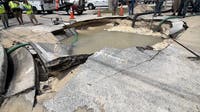 Water main break opens large crater, closes DeLand road