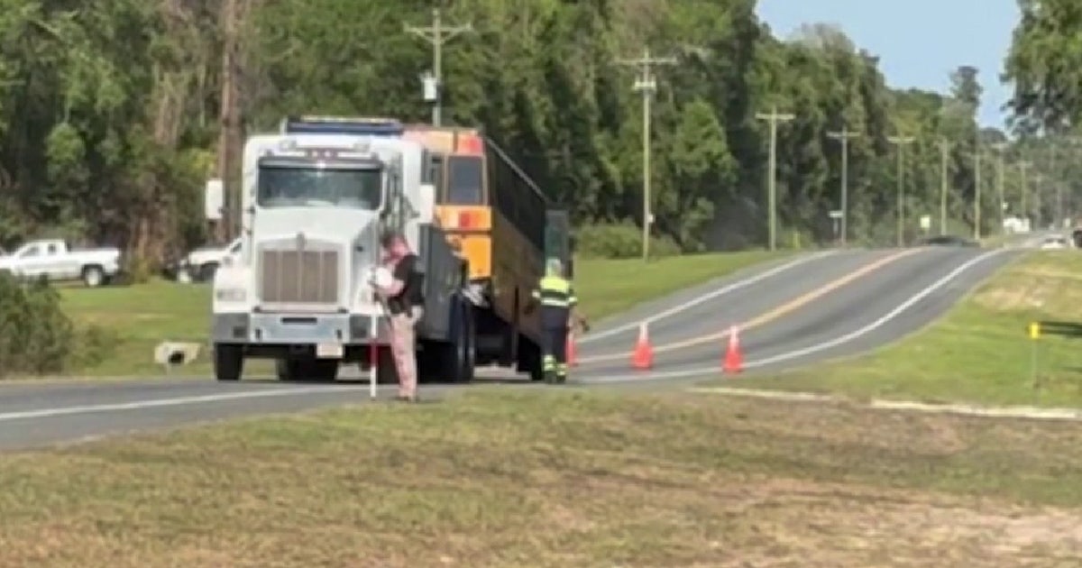 Truck driver died after school bus crash with students on board