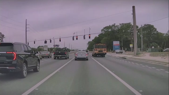 Florida school bus driver disciplined after running a red light with students on board