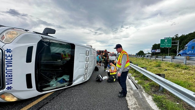3 people hospitalized after ambulance rollover crash on I-75; cause unknown