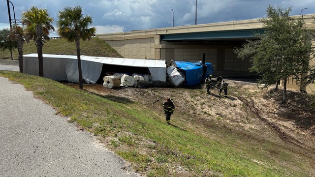 Overturned tractor-trailer leaking chlorine shuts down I-4 ramp in Maitland