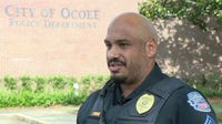 Ocoee police officer rescues woman trapped in overturned vehicle