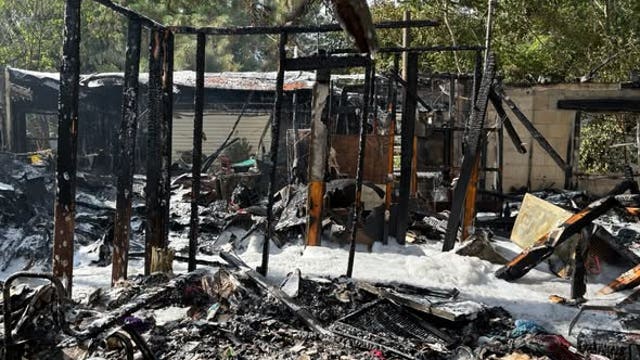 Crews battle heavy fire at Orange County home, officials say