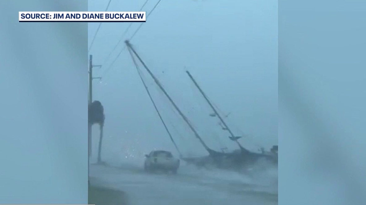 Storm drives sailboat into power lines near Eau Gallie Causeway