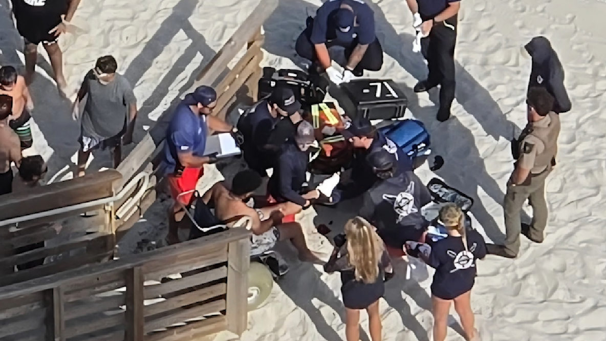 Tourist survives presumed shark bite on Volusia County beach, officials say
