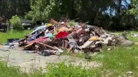 Titusville residents desperate for help cleaning up abandoned lot full of dangerous debris