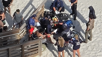 Tourist survives presumed shark bite on Volusia County beach, officials say