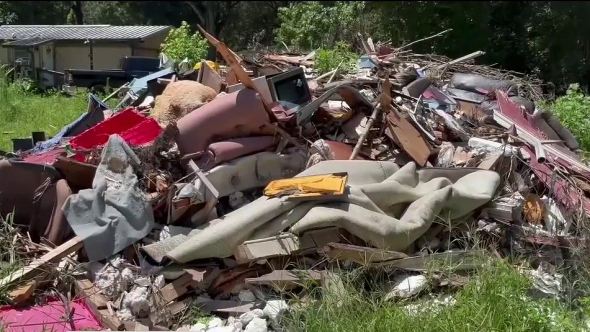 Massive cleanup of abandoned, dangerous debris home in Titusville sparked by FOX 35 report