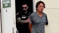 Man accused of killing, dismembering stepfather before hiding remains in suitcases