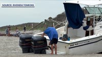 Beachgoers raise environmental concerns as stranded boat decays in Brevard County
