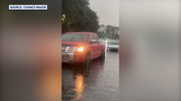 Best friends rescue drivers stranded in flooded Sanford intersection; county officials urge caution